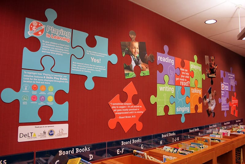 Wall Graphic of a teaching center that looks like a puzzle