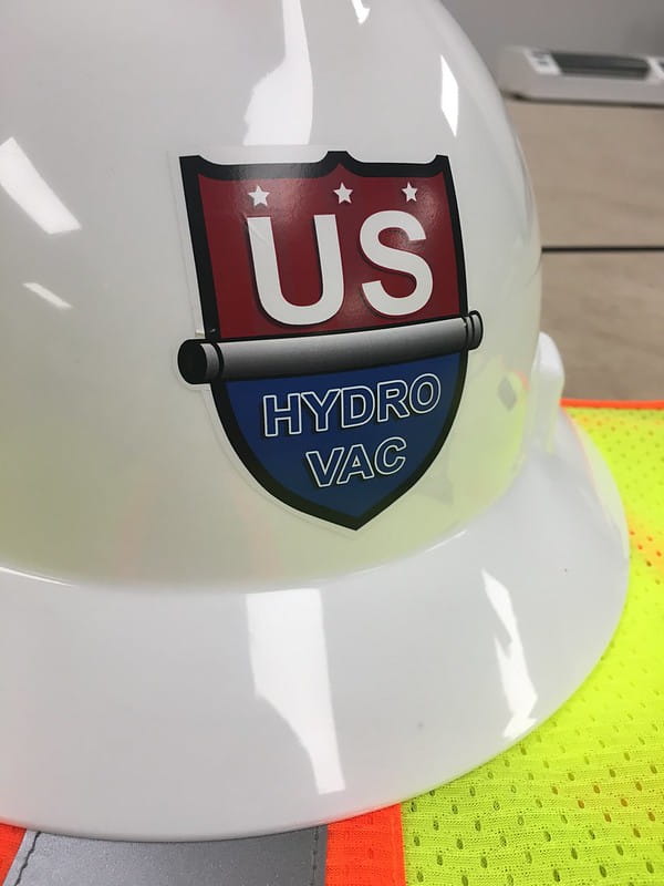 Uniform stickers of a VAC on a hard hat